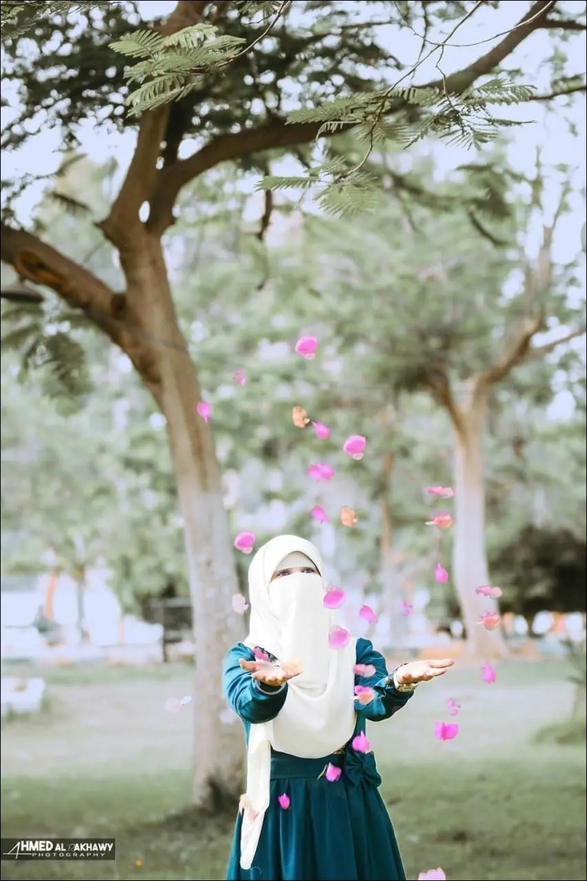 Artistic photo of a girl with a full hijab in nature for the most modern people