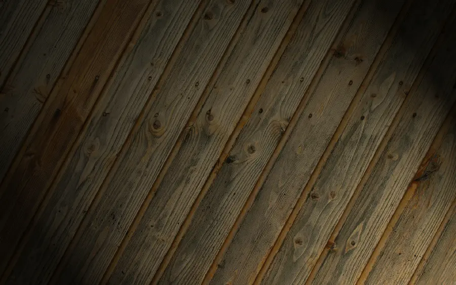 Stylish background of a charming ceiling with wooden planks next to each other