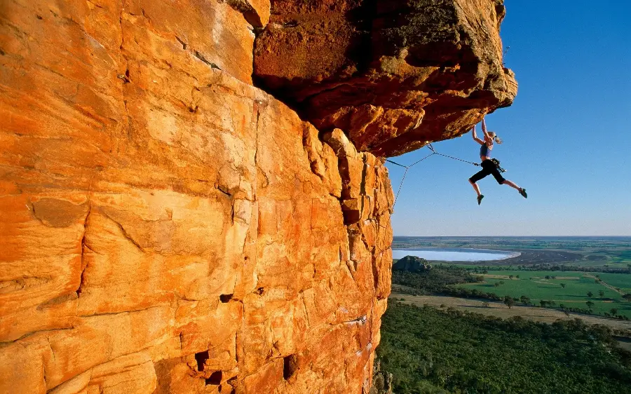Girly laptop background of strange and dangerous rock climbing
