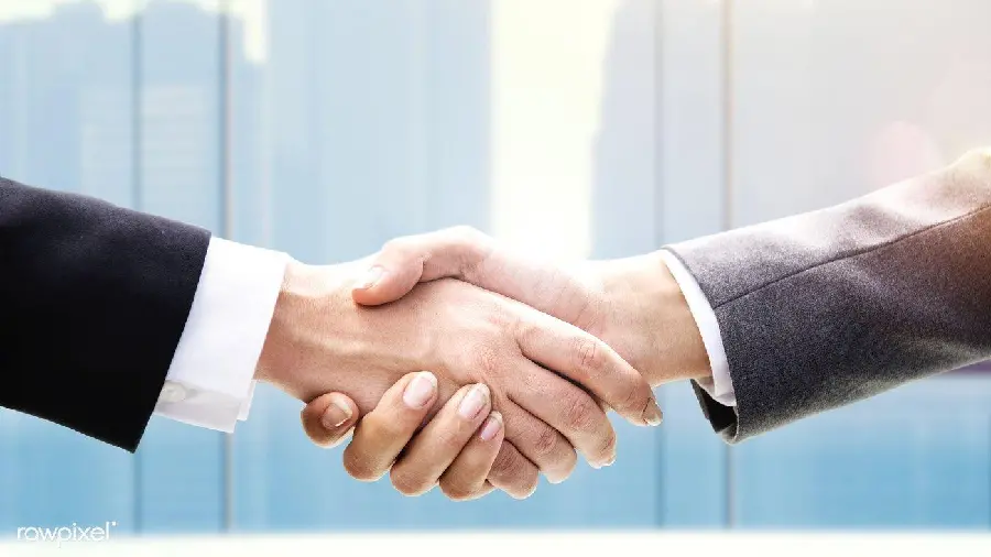 High quality stock photo of two people shaking hands suitable for printing