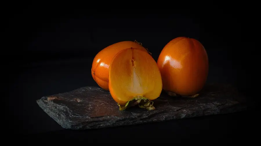 Amazing and interesting stock photo of healthy and delicious autumn persimmon fruit
