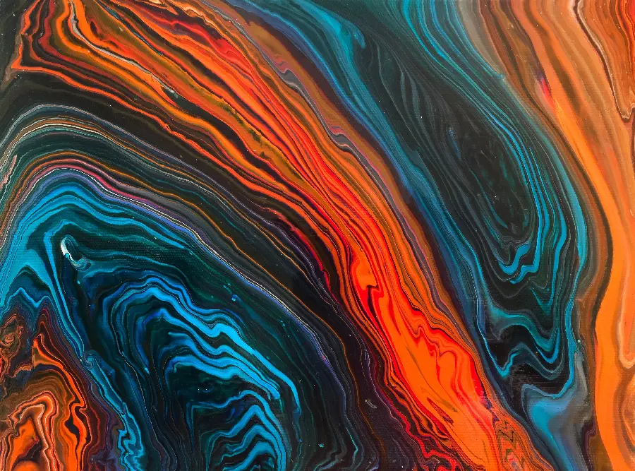 A spectacular wallpaper of the fusion of liquids in the form of molten volcanic material