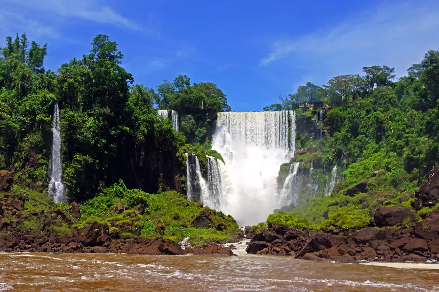 A photo of a waterfall in the middle of a lush forest, suitable for profiles and wallpapers 