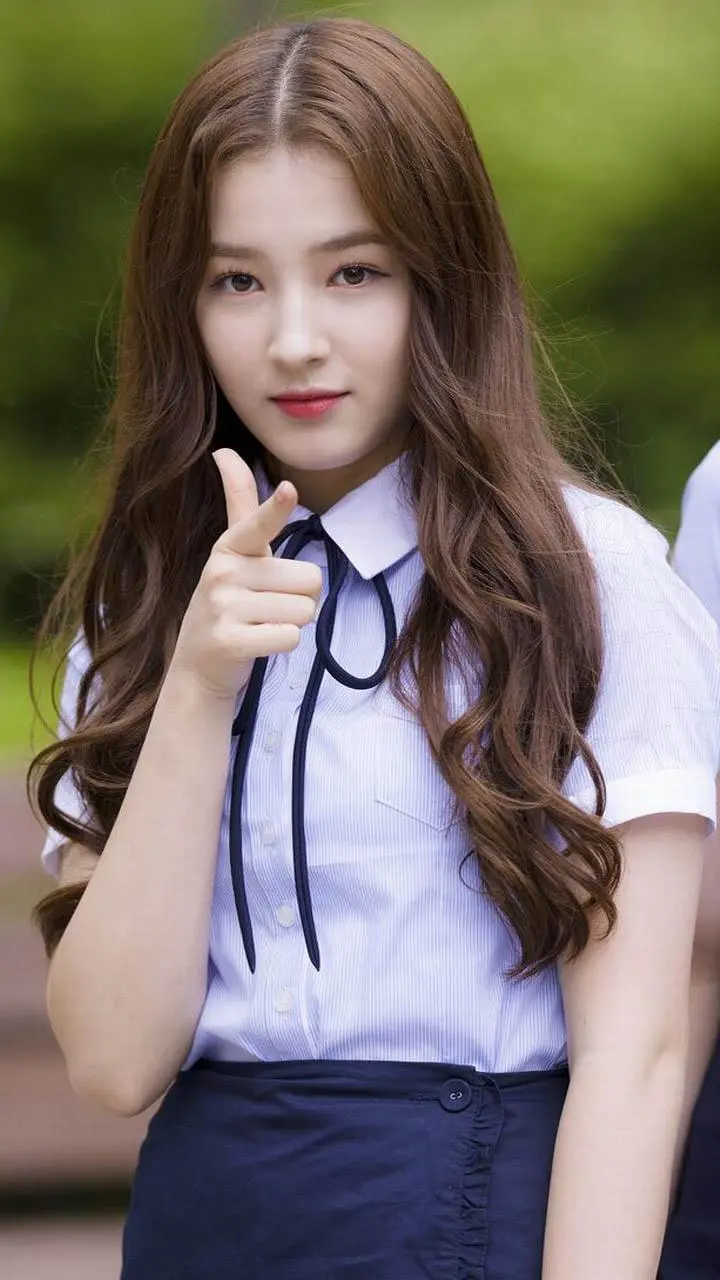 A wonderful image of Nancy with styled hair and uniform