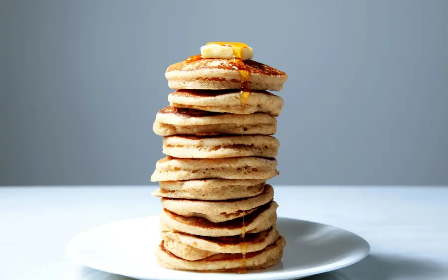 Serve of honey pancakes with butter, a complete and delicious breakfast 