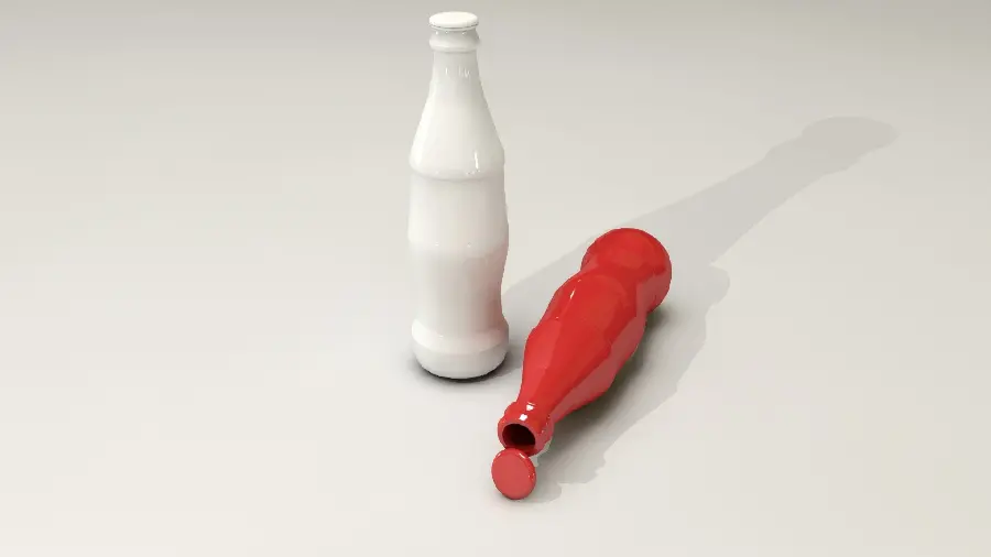 Interesting and beautiful photo of two white and red bottles for a boy's profile