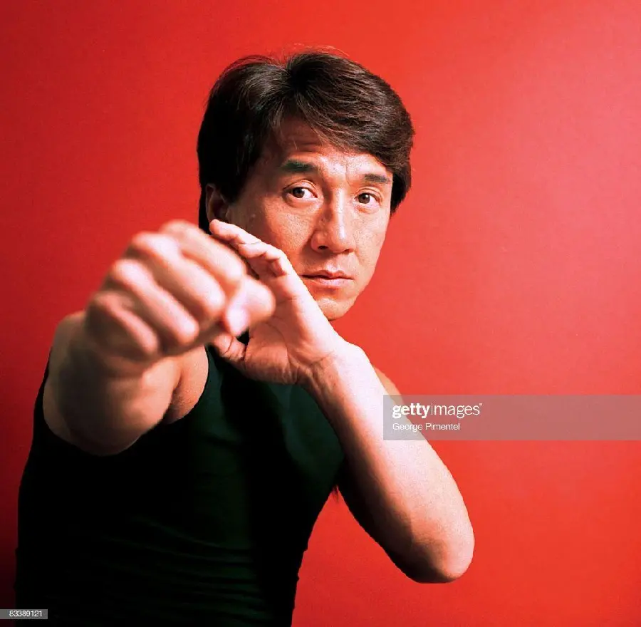Background photo of Jackie Chan, a famous martial artist and action talent in cinema