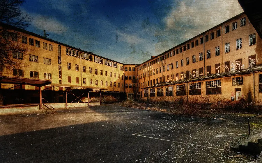 Interesting and spectacular image of an old school and its abandoned courtyard