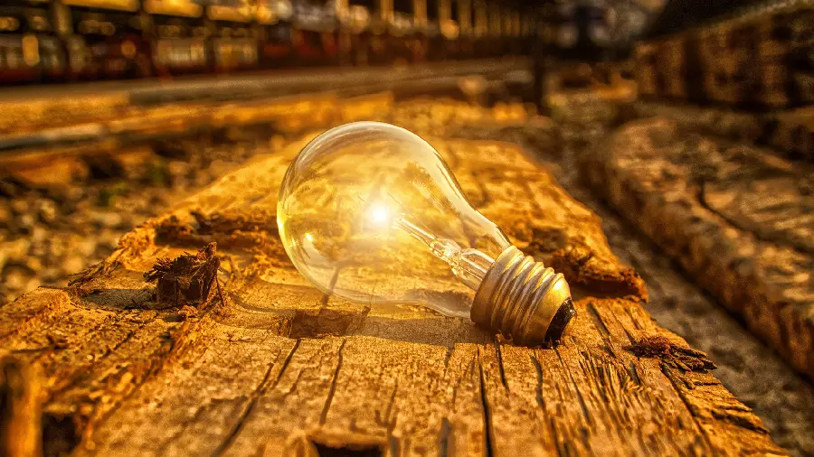 Unique and spectacular photo of a lighted lamp on tall sticks