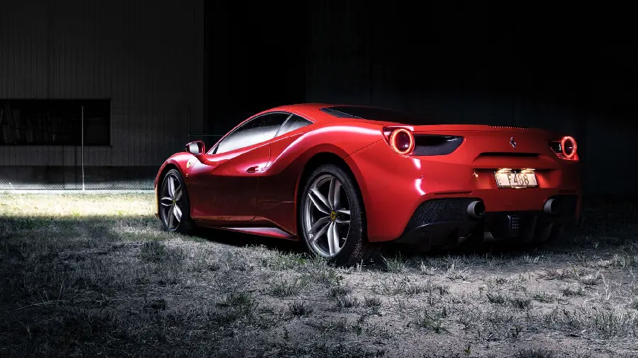 Attractive red Ferrari Spider or Ferrari 488 Spider photo from the back