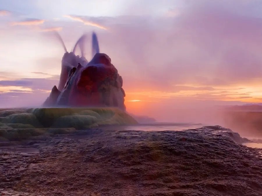 Beautiful purple profile with the image of Strokkur geyser in southern Iceland