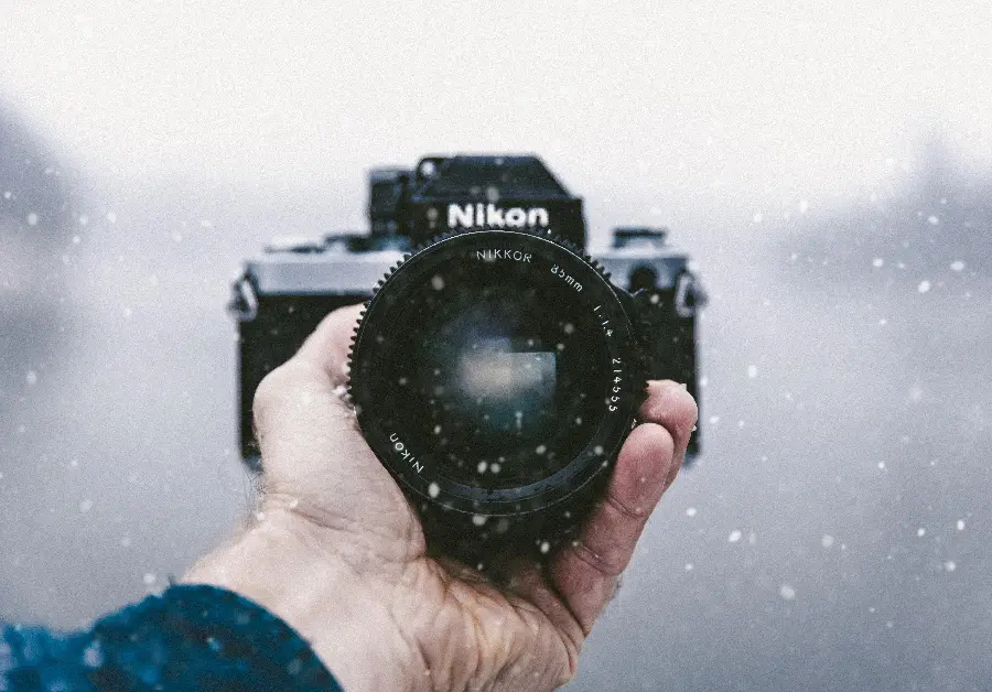Download new stock photo of a camera with a snowy background