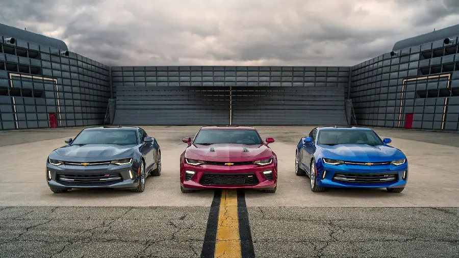 A very interesting and beautiful background of three foreign cars with beautiful colors 