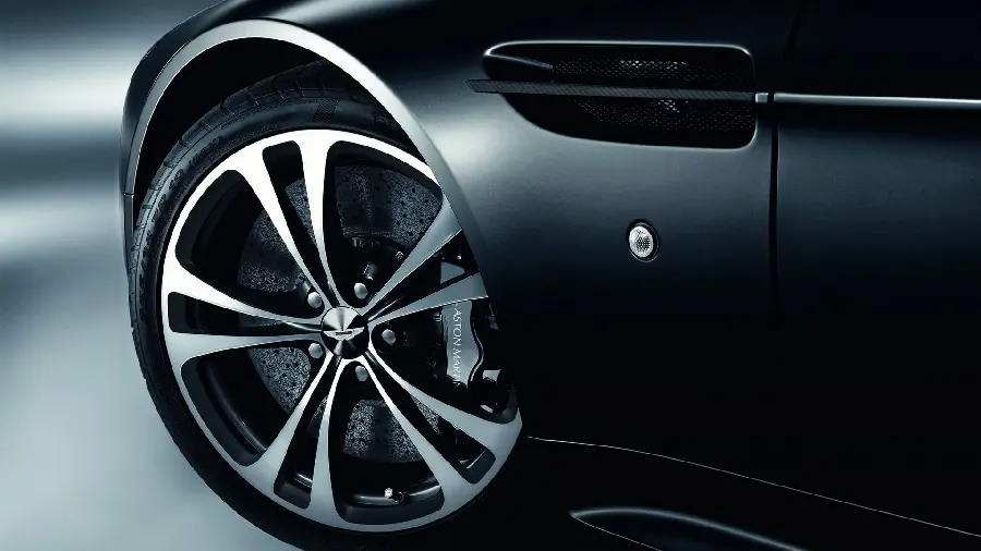 Sporty background photo of a black car with attractive silver rims