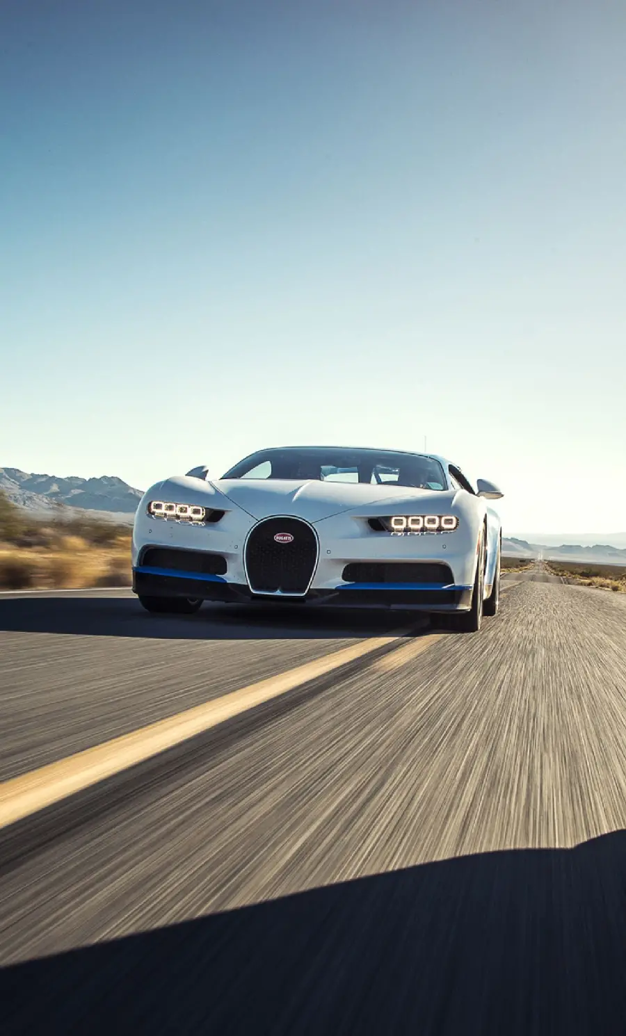 Background of a fast and light Bugatti car on the road for iPhone phone