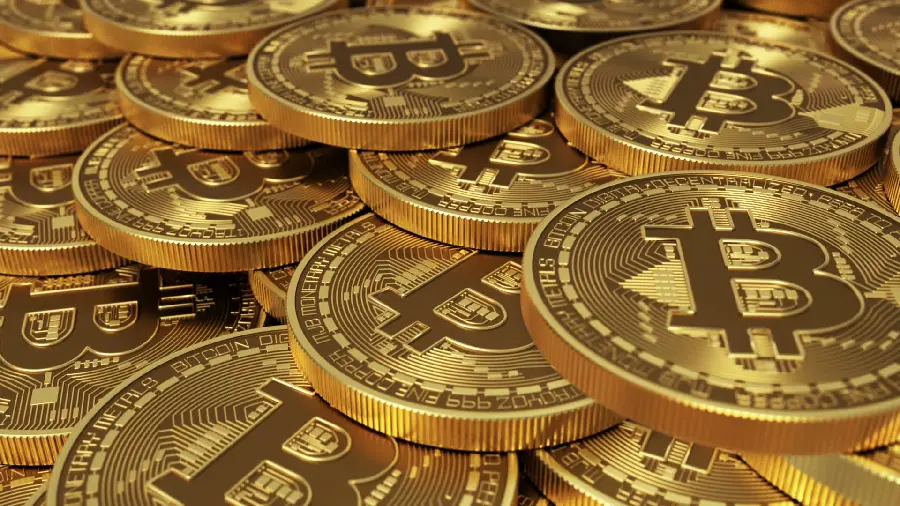 Get a stylish background of shiny and golden Bitcoin coins