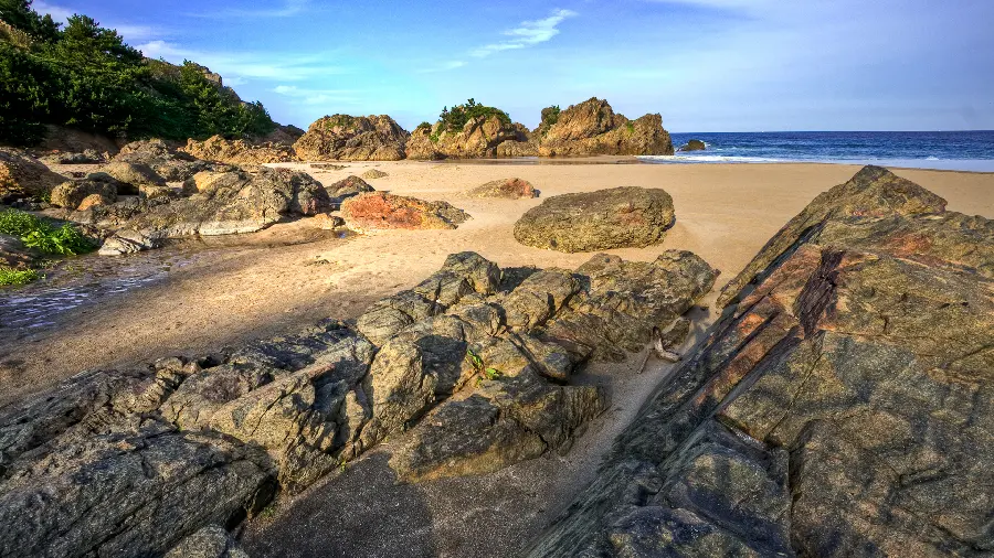 Nature background photo of a rocky beach with a nice weather for laptops