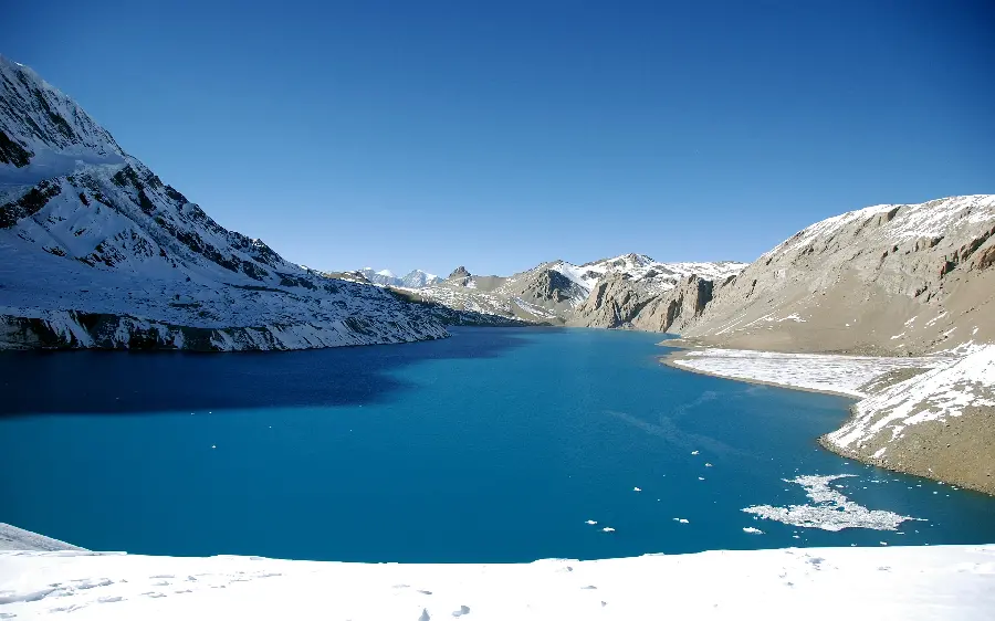 Download high-quality background of snowy mountains and frozen lake