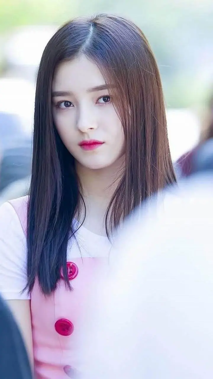 Lovely background image of Nancy in a pink dress 
