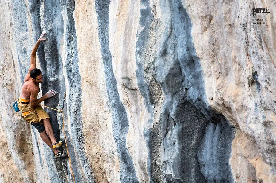 Spectacular 8k image of a powerful man's professional rock climbing 