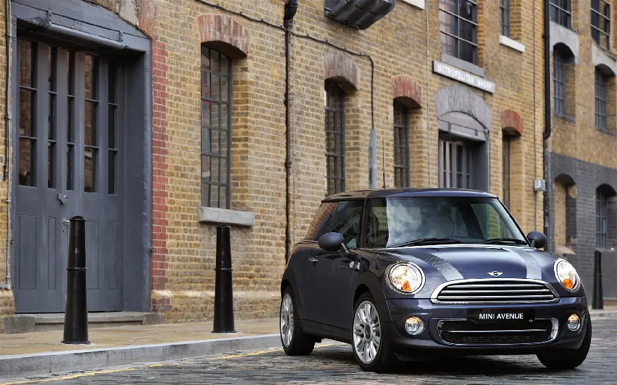 A spectacular background of the back streets of Italy and a black car
