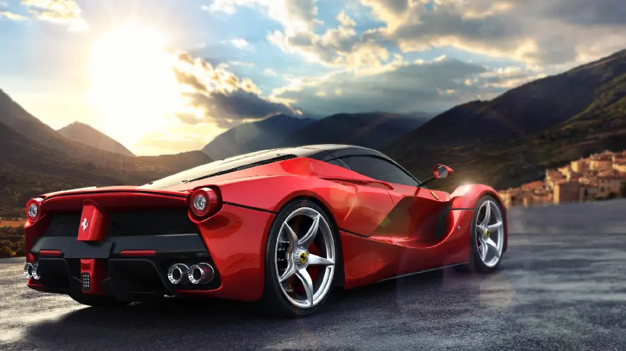 Beautiful and enchanting photo of a sunrise and a red Ferrari car 