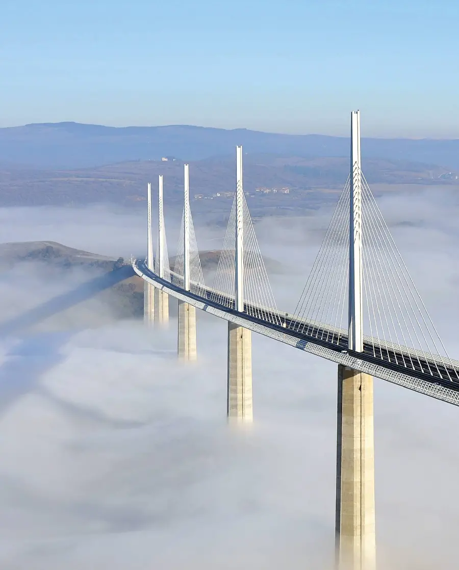 Download a very cool background of the Millau Bridge with a lot of fog 