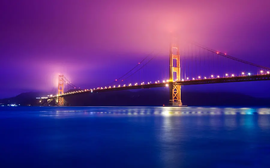 Download a high-quality photo of the Golden Gate Bridge with pink light suitable for printing 