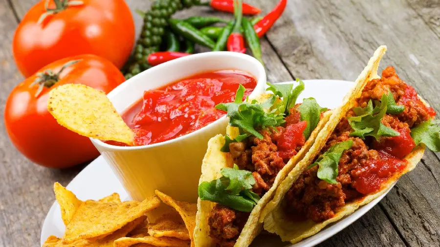Awesome background of delicious Mexican food with sauce 