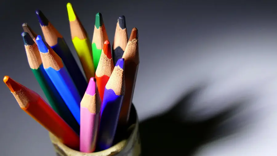 Attractive background of beautiful colored pencils 