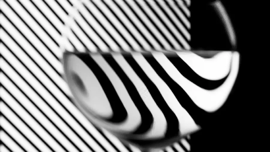  Extremely beautiful photo of a magnifying glass on a black and white background 