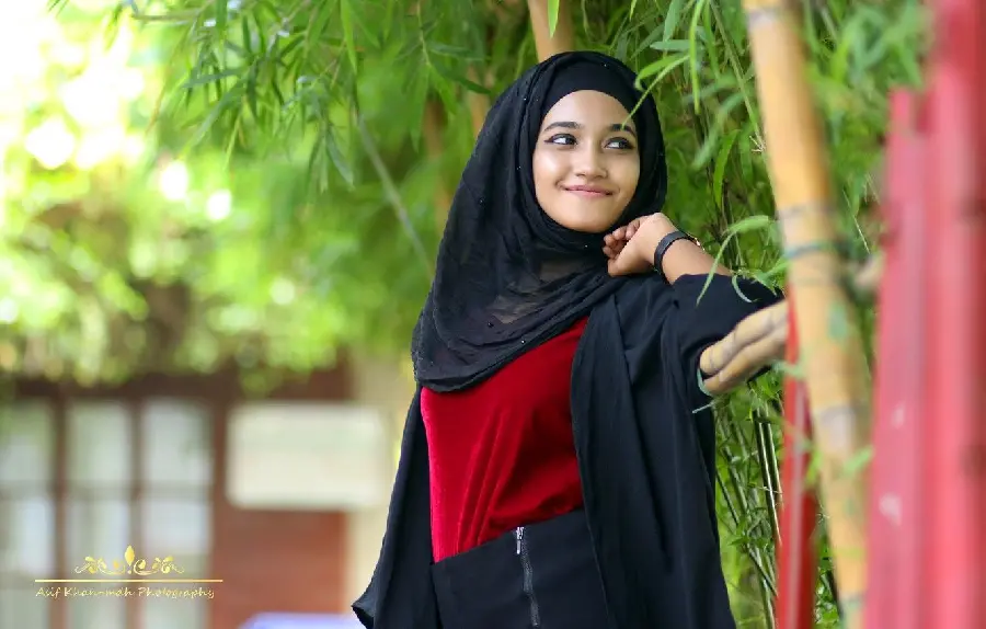 Photo of a brunette girl with a hijab in a pleasant landscape for those with good taste