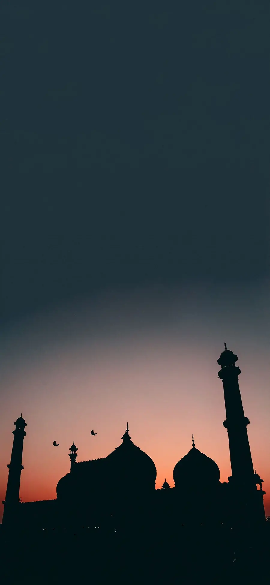 A very beautiful photo of an Islamic mosque with a beautiful sunset 