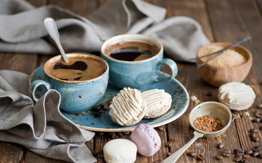 Beautiful photo of delicious coffee in turquoise cups 