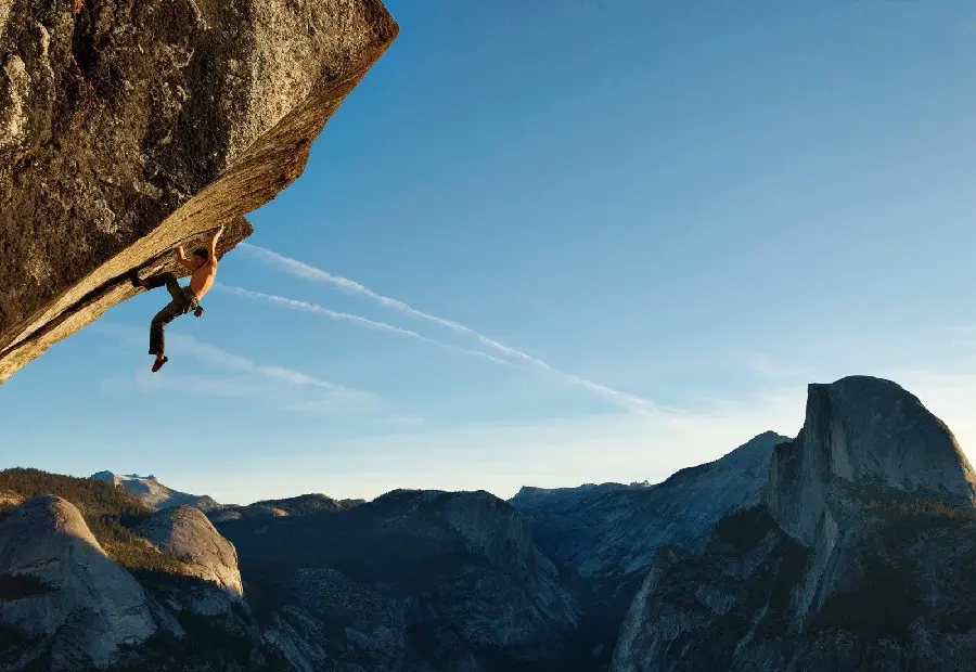 Scary rock climbing photo without equipment in hd quality 