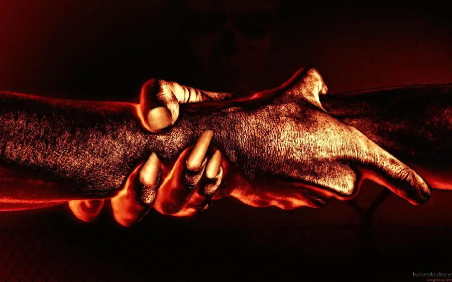 Free download of a man and a woman shaking hands in gold color