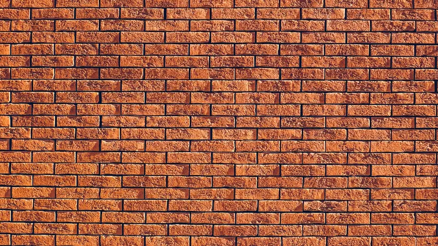 Stone texture or brick wall texture with geometric and three-dimensional patterns in architecture and interior