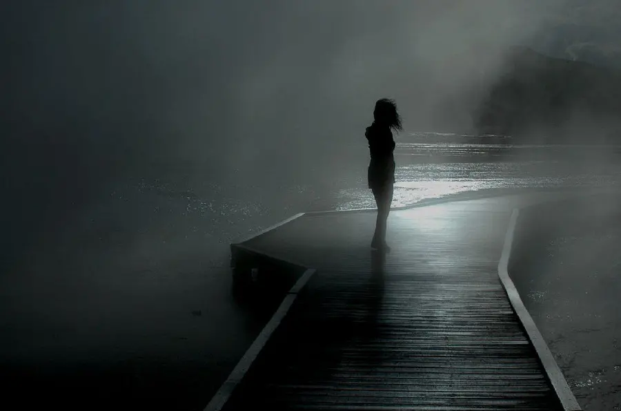 Sad and sad picture of a lonely girl in a dark night for profile