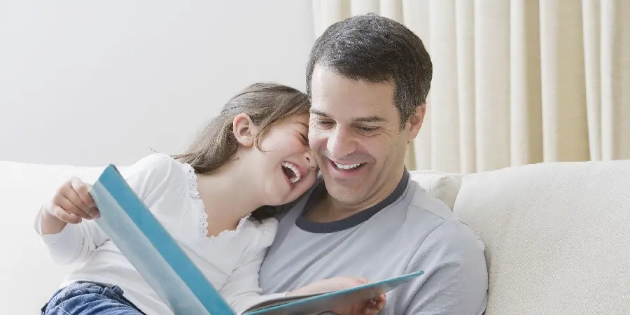 Father and daughter photo reading a book without text and in high quality 