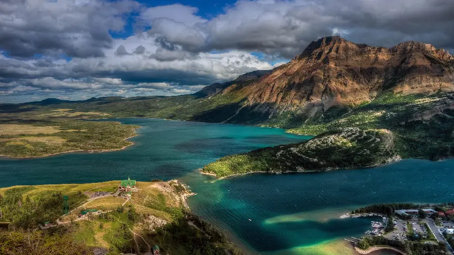 A fantastic and dreamy photo of green mountains by the lake 