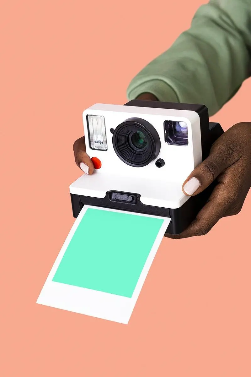 Download Image of Hand and Old Camera with Simple Color Wallpaper 