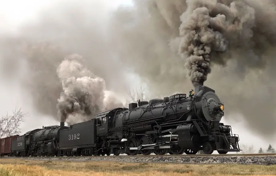 Beautiful black locomotive background with wide steam for laptops and computers