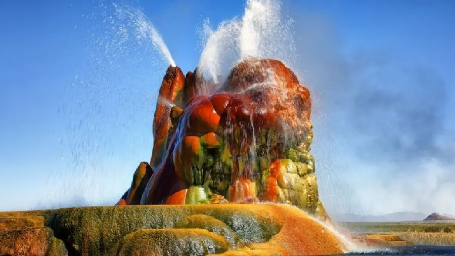 A mesmerizing frame of the geyser phenomenon with hot water shooting 30 meters above the ground