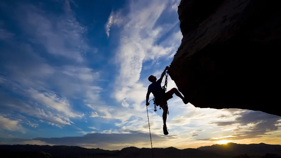 Creepy profile photo of a man hanging from a cliff for Telegram