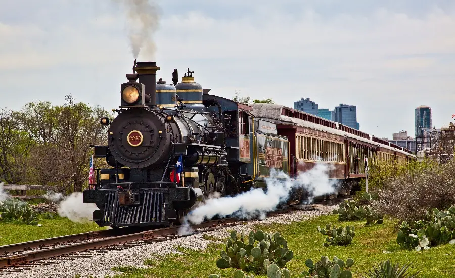 Image of a stylish and luxurious American steam locomotive on the rails 2023