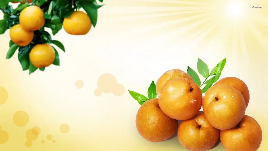 Beautiful background of fantasy apricots with green leaves next to it