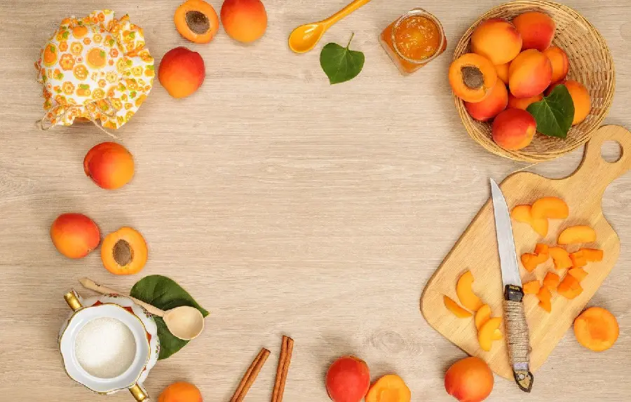 Beautiful background of a great arrangement of apricots and their jam in high quality 