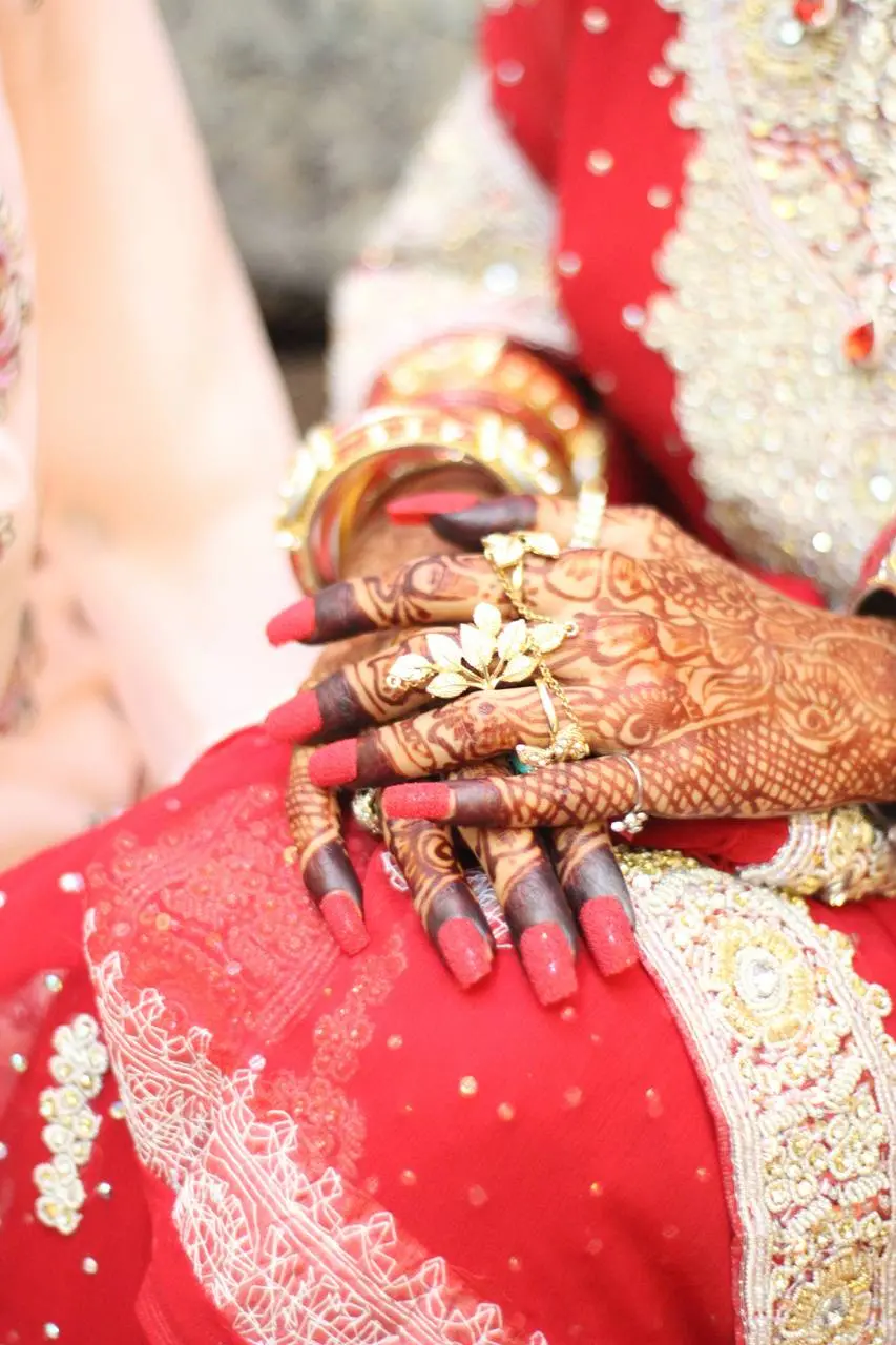 Photo of a new model of henna on the hand with an Indian pattern for a wedding ceremony