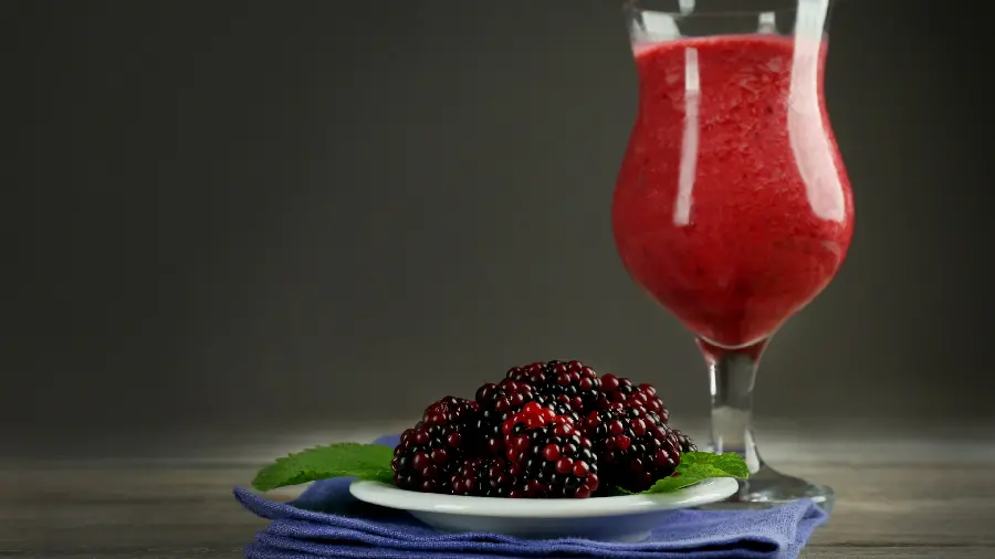 A very delicious wallpaper of blackberry juice with a red color 