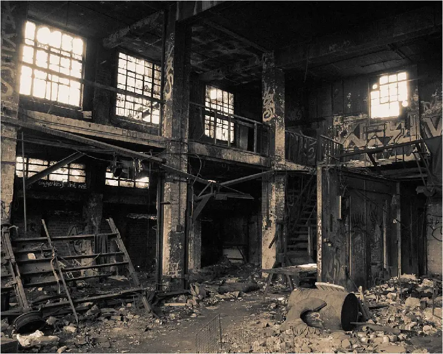 Photo Profile image of a ruined and abandoned factory with broken equipment